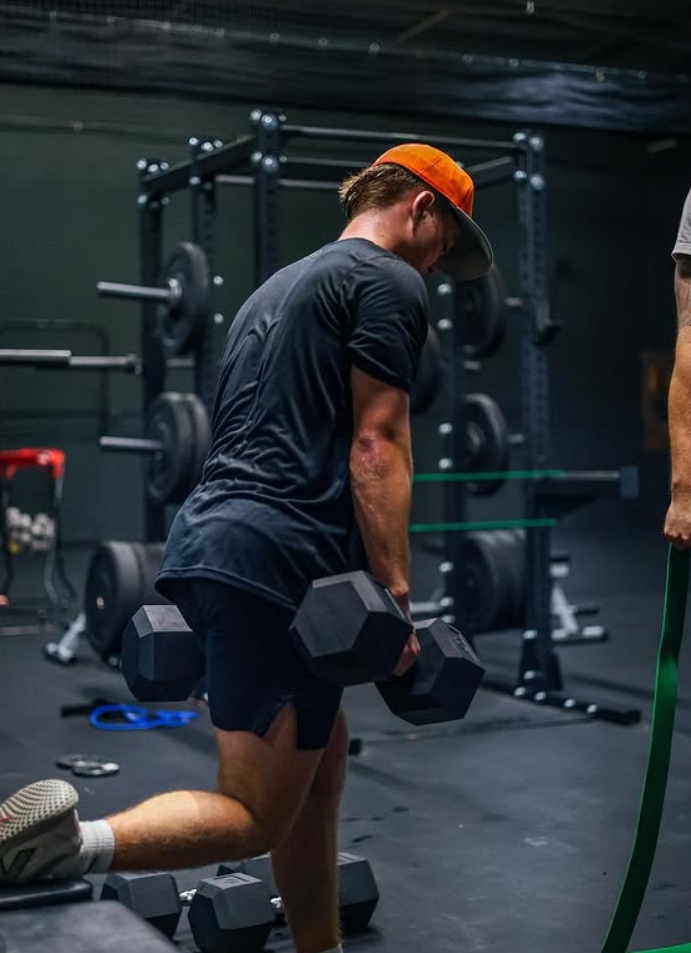Athlete training with dumbbells at TSP